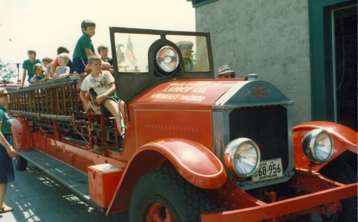 The Northeast Harbor Fire Company's 1927 American LaFrance Ladder truck loaded with children